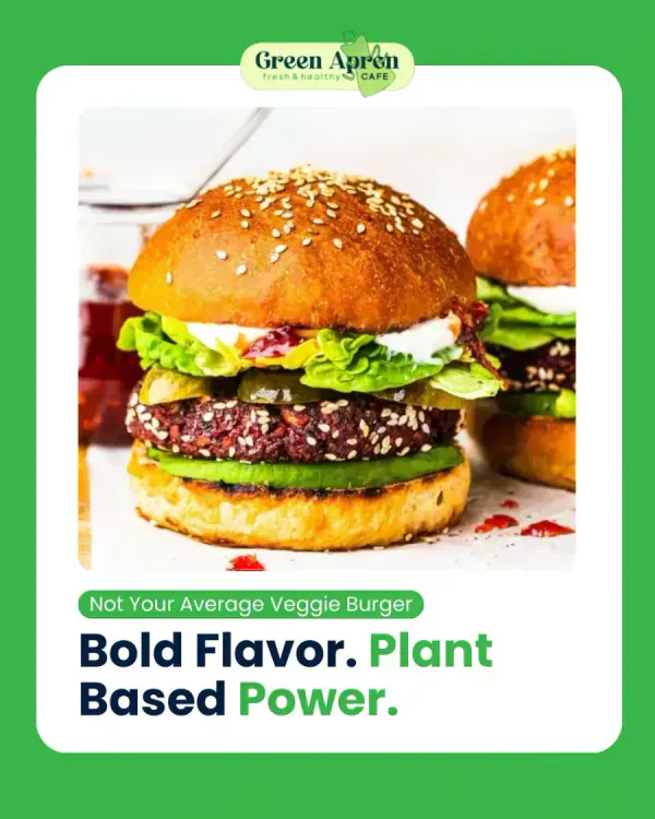 A plant-based burger with lettuce and pickles on a green background
