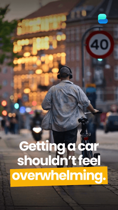 A cyclist in city traffic with a caption about car buying feeling overwhelming