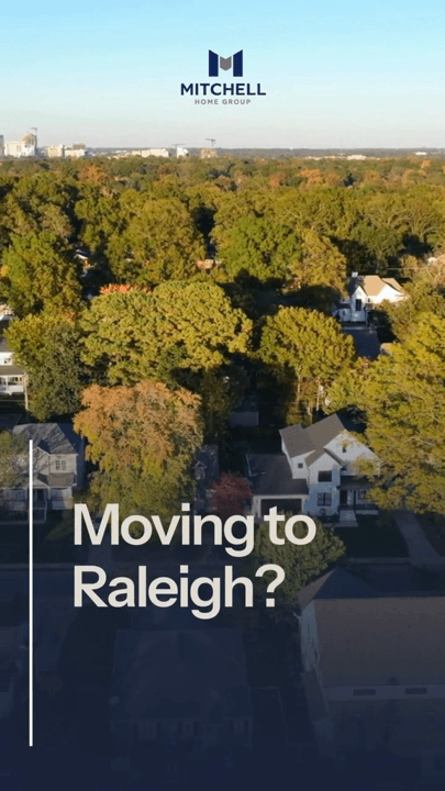 An aerial view over a wooded neighbourhood asking Moving to Raleigh