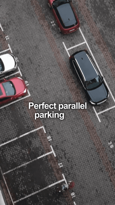 An overhead view of a parking lot demonstrating parallel parking