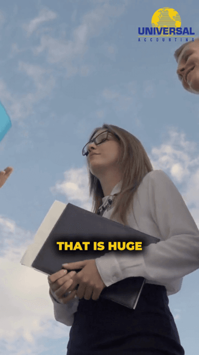 A student holding a folder against the sky during an accounting promo